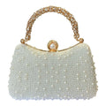 Pearl-embellished Gold Handle clutch
