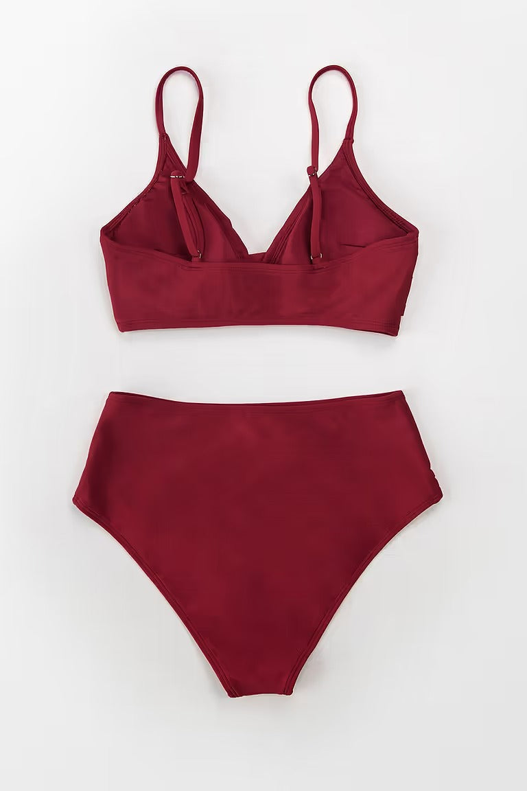 High-waisted bikini with twisted front and hipster surplice