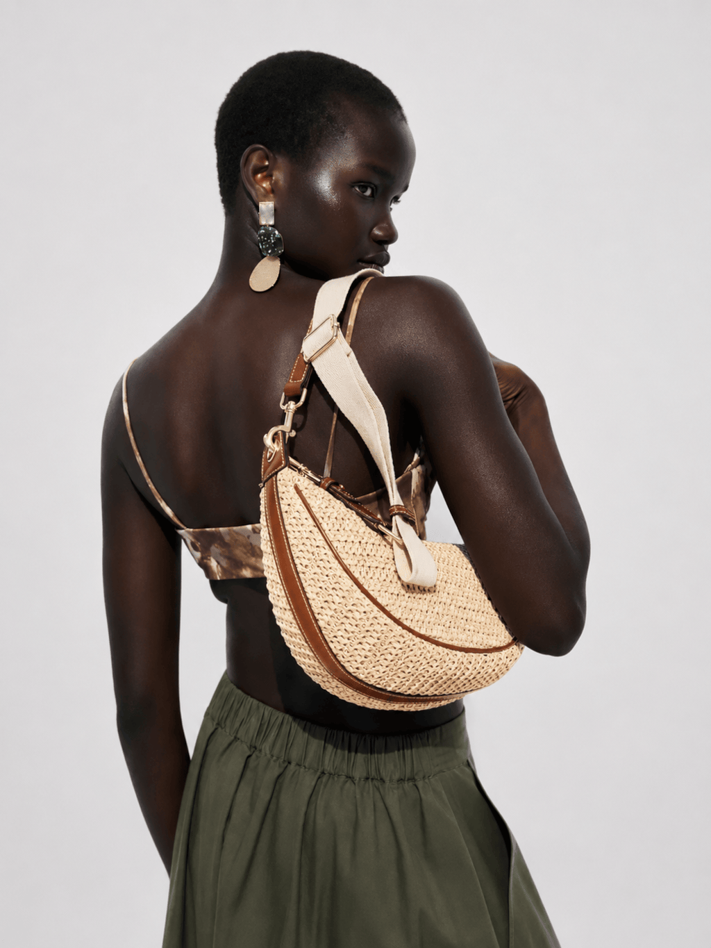 Half-moon straw bag