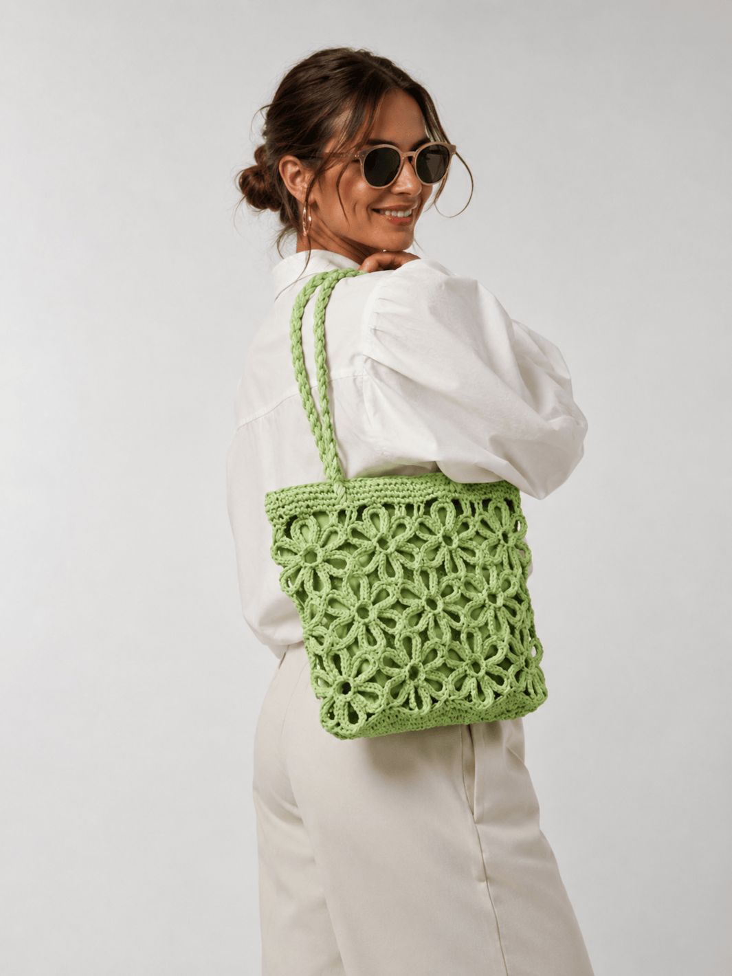 Woven straw bag with floral pattern