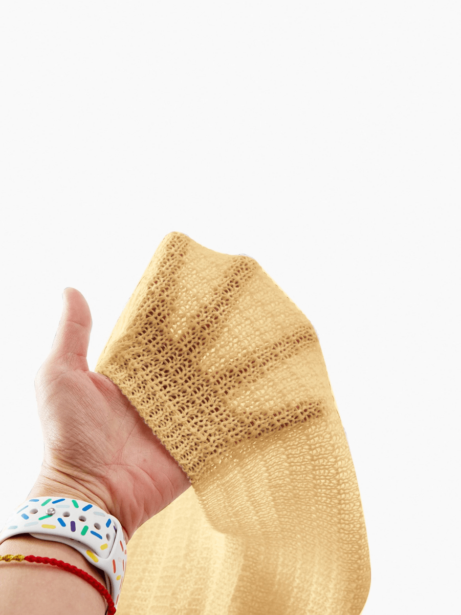 Soleil Dress – Knit Mini Dress with a Deep V-Neckline and Gold Accents