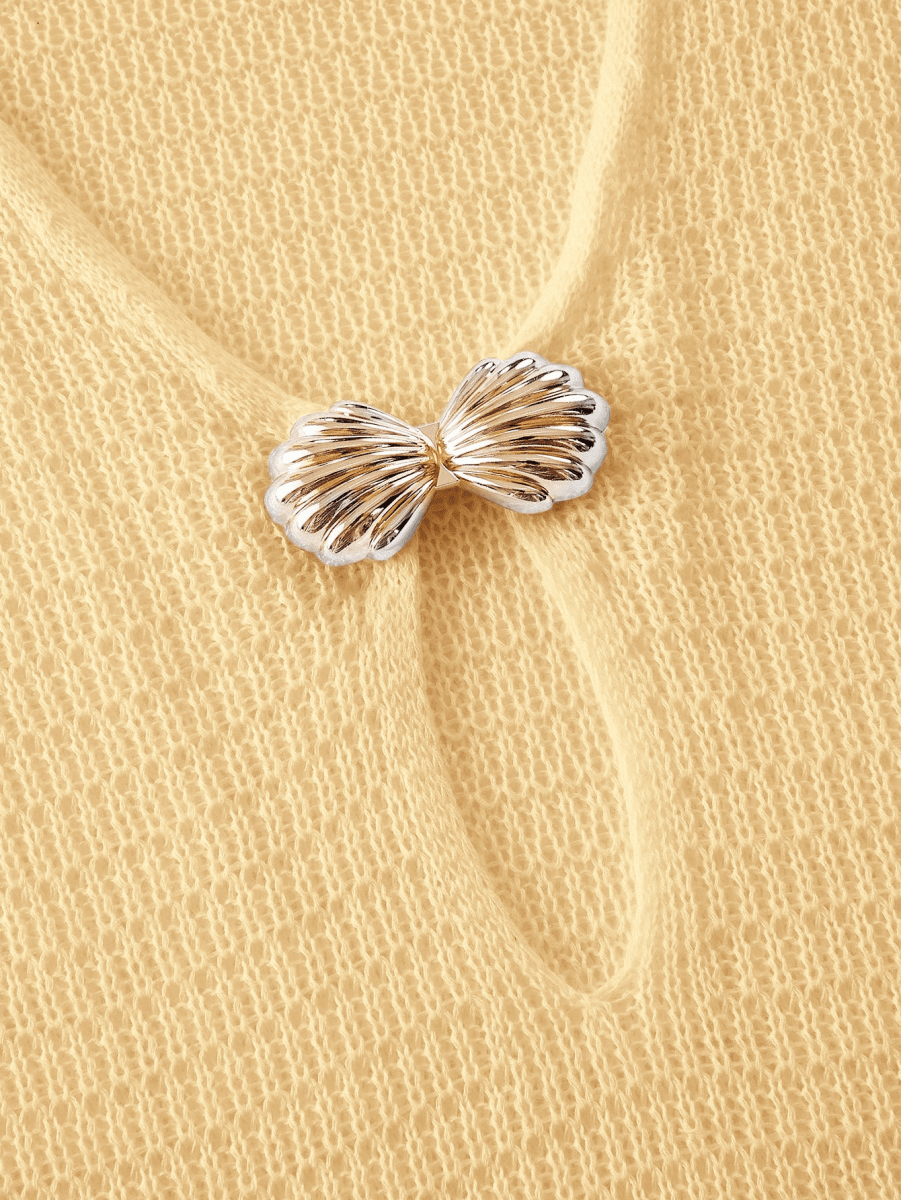 Soleil Dress – Knit Mini Dress with a Deep V-Neckline and Gold Accents